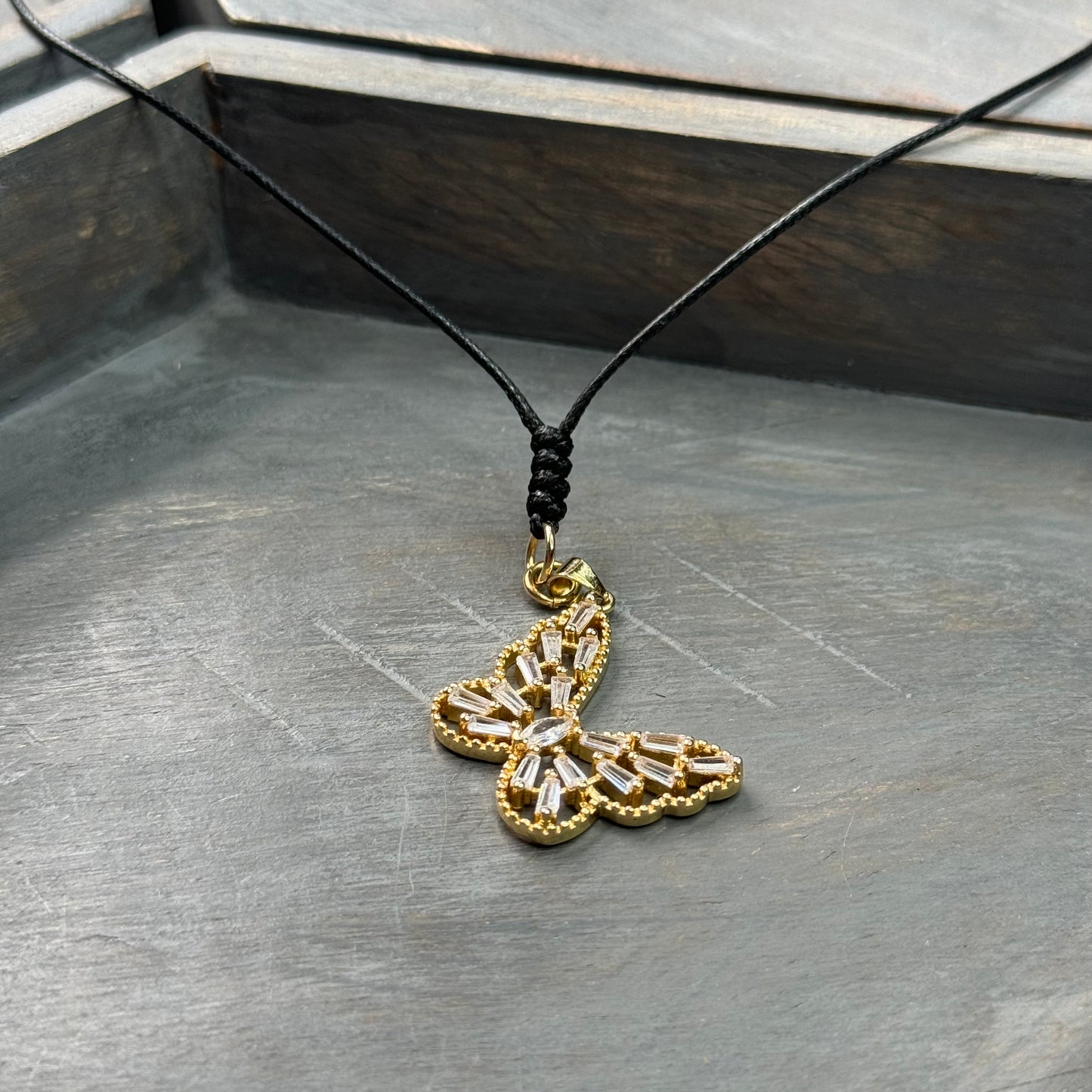 Cord Necklace with Crystal Butterfly Pendant